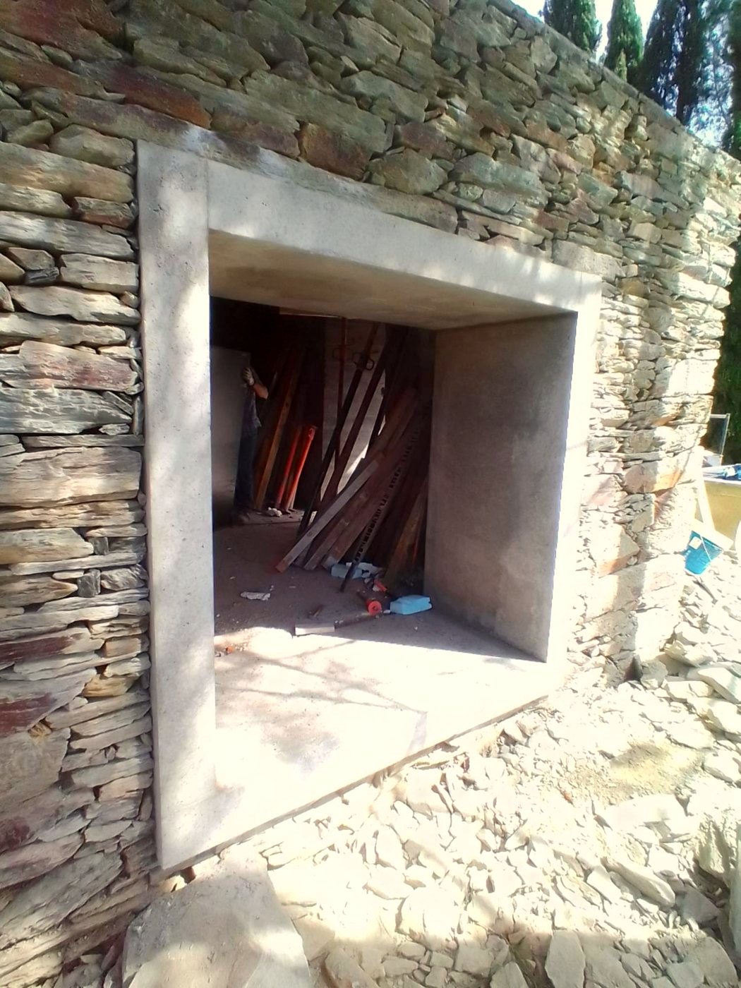 New window opening in an old schist wall